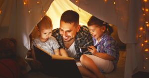 dad with 2 kids in tent