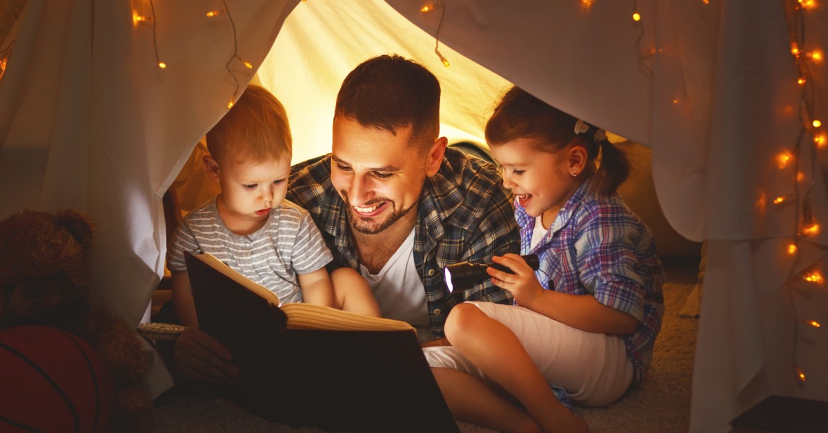 dad with 2 kids in tent
