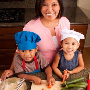 children cooking with. mother
