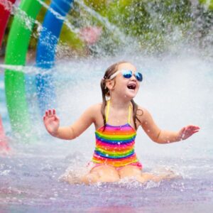Child playing in water park