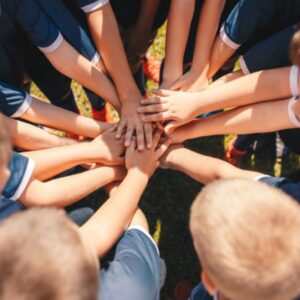 A group of kids cheering