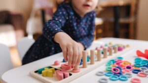 img of a child leanring with a puzzle