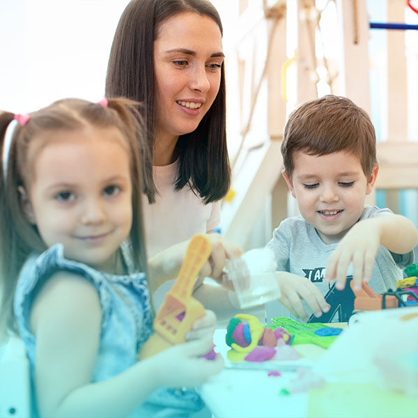 teacher with 2 children